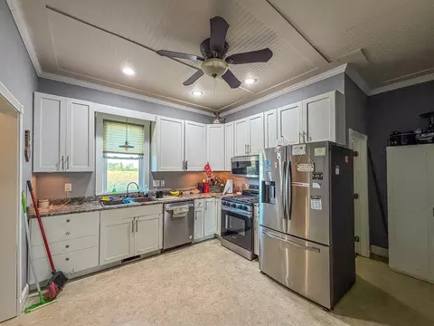 Kitchen - 220 E 4th St, Arcola, IL 61910 photo 1 of 2