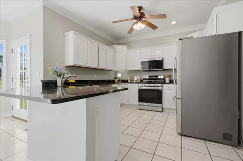 Kitchen - 409 Whispering Pines Cc Ln, Normal, IL 61761 photo 2 of 4