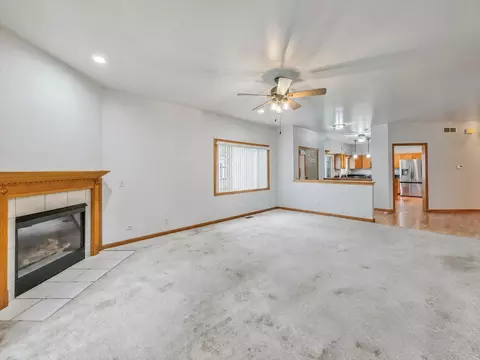 Living - 1321 Dancing Bear Ln, Elgin, IL 60120 photo 4 of 5