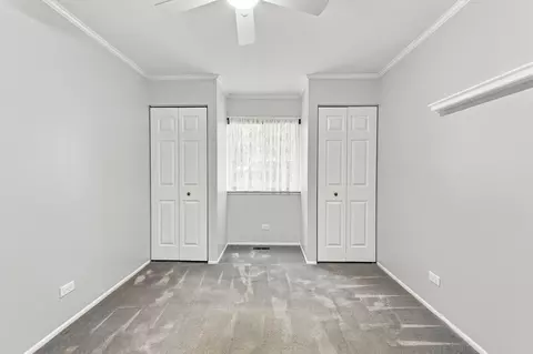 Bedroom - 586 Williamsburg Ct #A1, Wheeling, IL 60090 photo 4 of 5