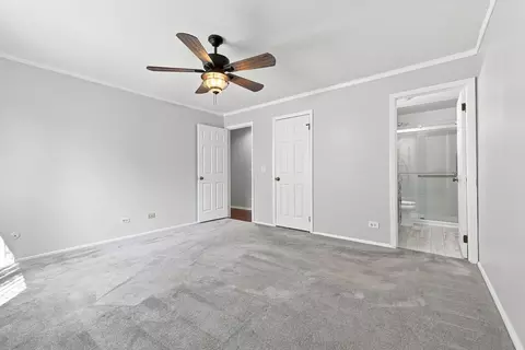 Bedroom - 586 Williamsburg Ct #A1, Wheeling, IL 60090 photo 2 of 5