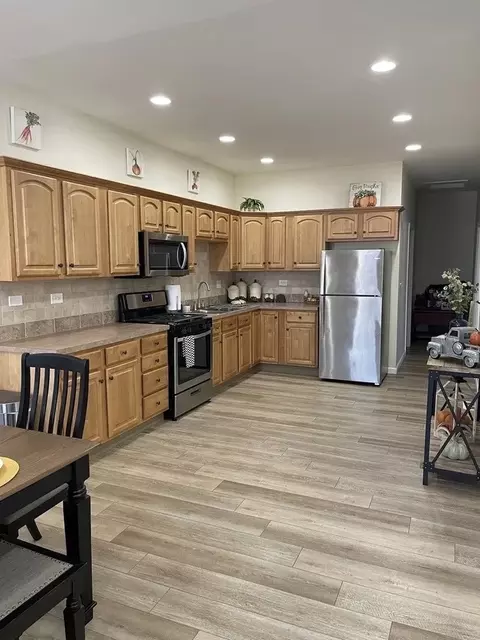 Kitchen - 15 E 32nd St, Steger, IL 60475 photo 2 of 5