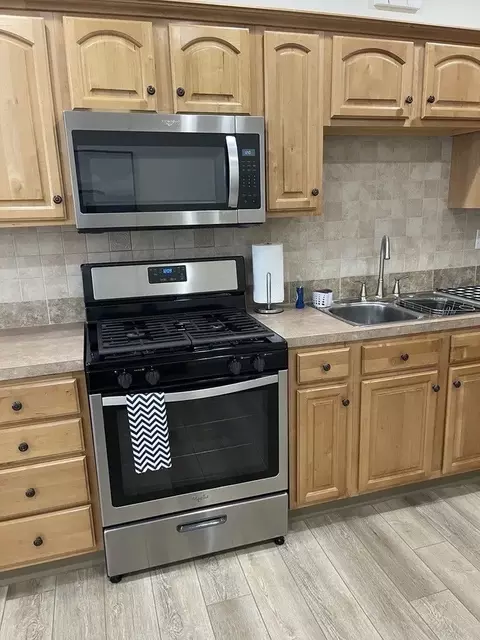 Kitchen - 15 E 32nd St, Steger, IL 60475 photo 4 of 5