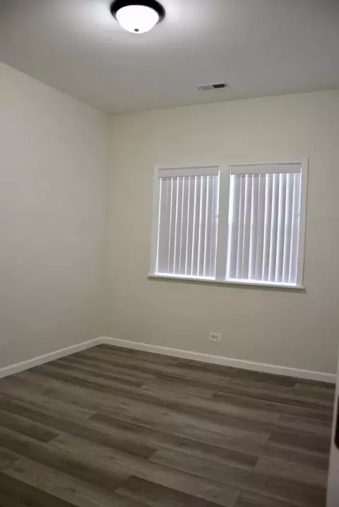 Bedroom - 15 E 32nd St, Steger, IL 60475 photo 3 of 6