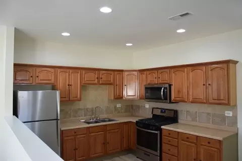 Kitchen - 15 E 32nd St, Steger, IL 60475 photo 1 of 5