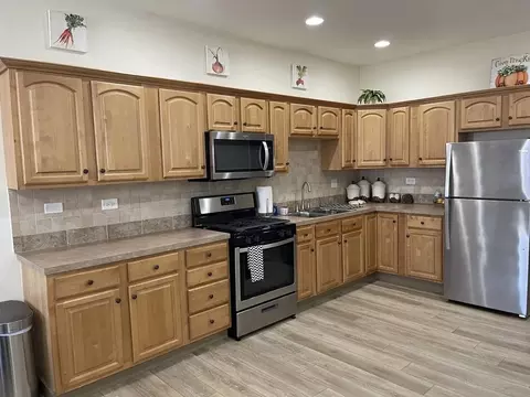 Kitchen - 15 E 32nd St, Steger, IL 60475 photo 3 of 5