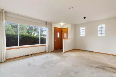 Living - 7101 W Devon Ave, Chicago, IL 60631 photo 2 of 6