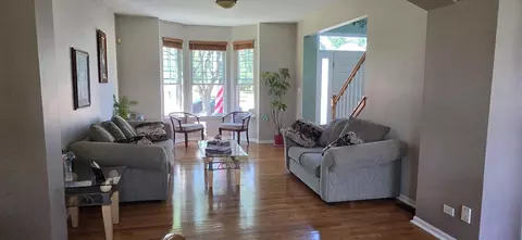 Living - 25553 N Cinnamon Ct, Plainfield, IL 60585 photo 2 of 3