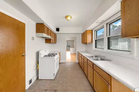 Kitchen - 13 W 37th St, Steger, IL 60475 photo 3 of 3