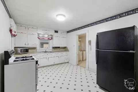 Kitchen - 104 E Cleveland St, Cullom, IL 60929 photo 3 of 3