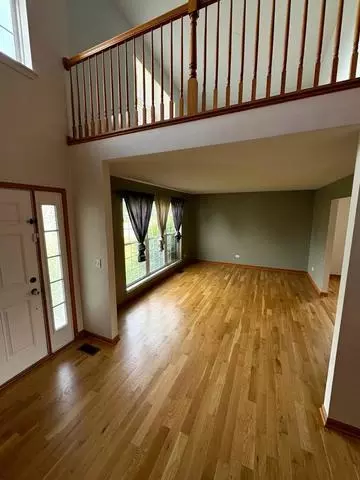 Living - 1301 Burns Ct, Minooka, IL 60447 photo 1 of 2