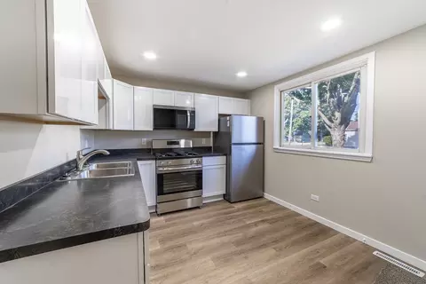 Kitchen - 18 E Dearborn St, Plano, IL 60545 photo 2 of 2