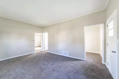 Living - 18 E Dearborn St, Plano, IL 60545 photo 2 of 2