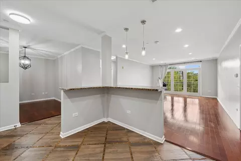 Living - 660 Mchenry Rd #207, Wheeling, IL 60090 photo 1 of 3