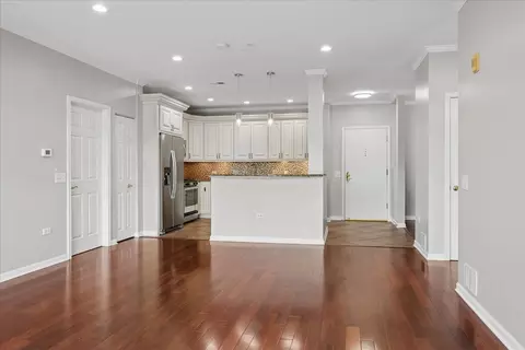 Living - 660 Mchenry Rd #207, Wheeling, IL 60090 photo 3 of 3