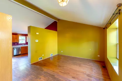 Living - 5210 Pine Trails Cir, Plainfield, IL 60586 photo 1 of 8