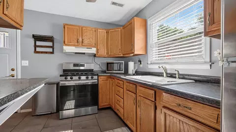 Kitchen - 1121 N State St, Bloomington, IL 61701 photo 2 of 3
