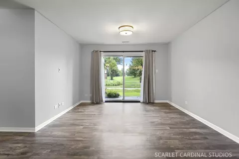 Living - 1773 Gloucester Ct #A, Wheaton, IL 60189 photo 2 of 3