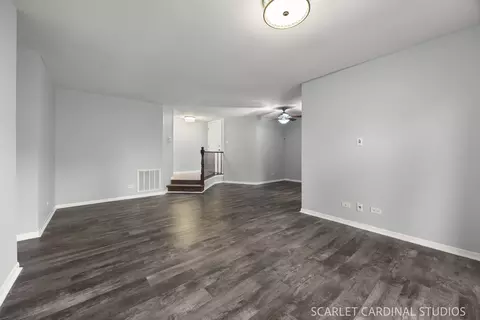 Living - 1773 Gloucester Ct #A, Wheaton, IL 60189 photo 1 of 3
