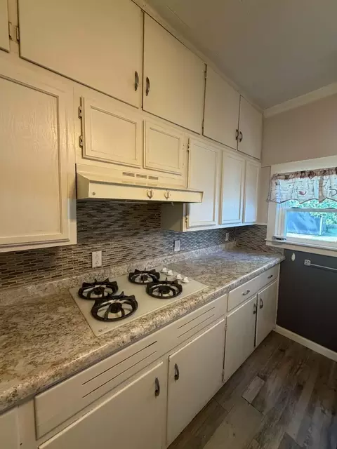 Kitchen - 405 S State St, Christopher, IL 62822 photo 2 of 3