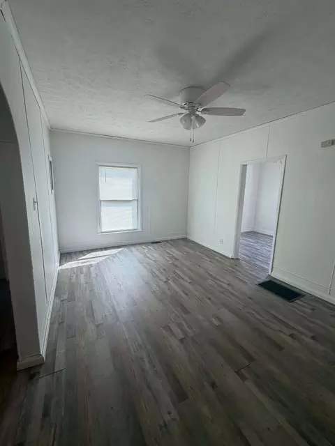 Living - 405 S State St, Christopher, IL 62822 photo 3 of 3