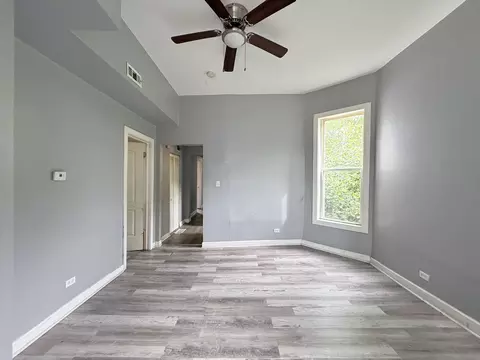 Living - 6835 S Champlain Ave, Chicago, IL 60637 photo 4 of 10