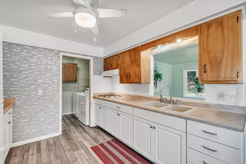 Kitchen - 115 E 3rd Ave, Coal Valley, IL 61240 photo 2 of 2