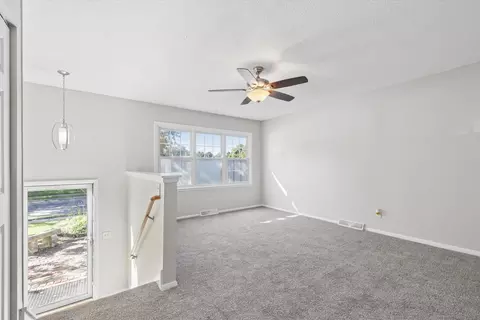 Living - 507 S 3rd St, Eldridge, IA 52748 photo 2 of 3