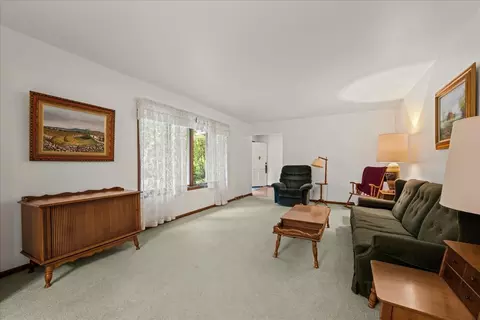 Living - 1300 Woodland Dr, Aurora, IL 60505 photo 1 of 3