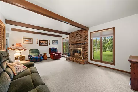 Living - 1300 Woodland Dr, Aurora, IL 60505 photo 2 of 3