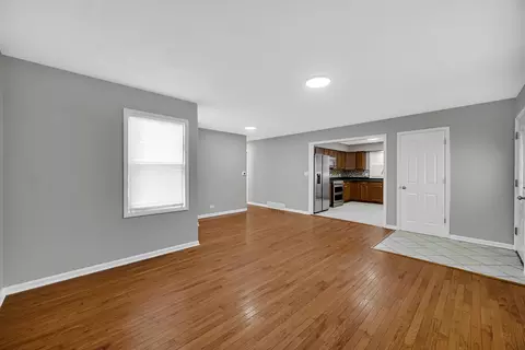 Living - 1007 Cedar Ave, Elgin, IL 60120 photo 3 of 3