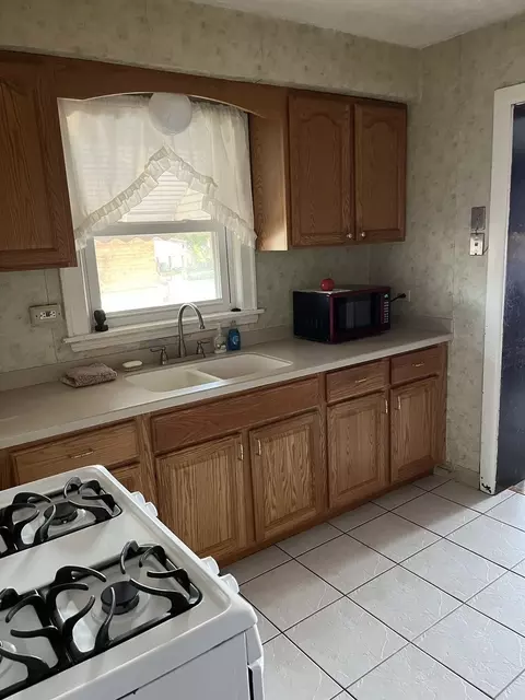 Kitchen - 2428 S 17th Ave, Broadview, IL 60155 photo 1 of 2