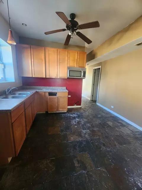 Kitchen - 852 E 88th St, Chicago, IL 60619 photo 1 of 2