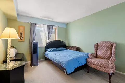 Bedroom - 612 Cobblestone Cir #E, Glenview, IL 60025 photo 2 of 2