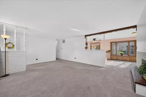 Living - 137 Saint Armand Ln, Wheeling, IL 60090 photo 3 of 6