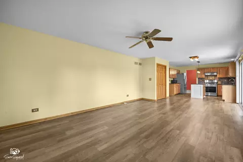 Living - 1613 Wildflower Dr, Plainfield, IL 60586 photo 5 of 6