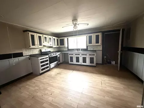 Kitchen - 103 E 11th St, Belle Rive, IL 62810 photo 2 of 3