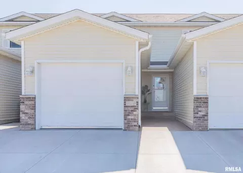 720 Prairie Meadow Dr, Blue Grass, IA 52726
