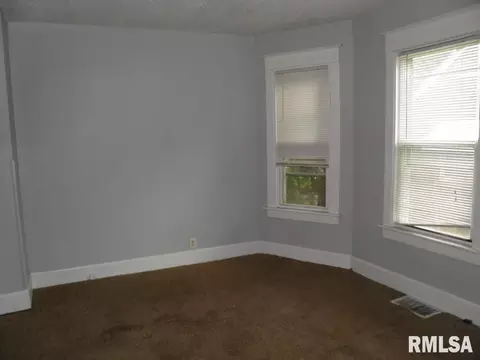 Living - 250 44th St, Moline, IL 61265 photo 1 of 1