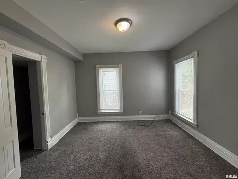 Living - 1007 29th St, Moline, IL 61265 photo 2 of 2