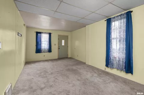 Living - 158 5th St, Silvis, IL 61282 photo 1 of 2