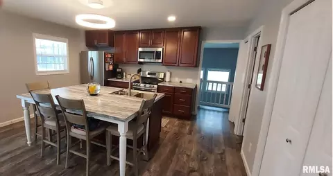 Kitchen - 201 W E St, Alpha, IL 61413 photo 2 of 3