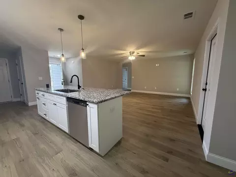 Living - 211 Sutton Dr, Perry, GA 31069 photo 1 of 2