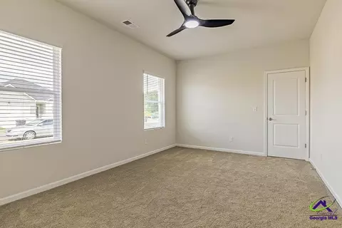 Bedroom - 645 Encore Dr #LOT 118, Perry, GA 31069 photo 5 of 8