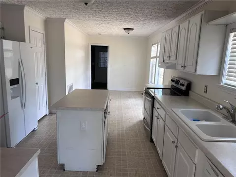 Kitchen - 1077 Polson Cir NE, Shellman Bluff, GA 31331 photo 4 of 6