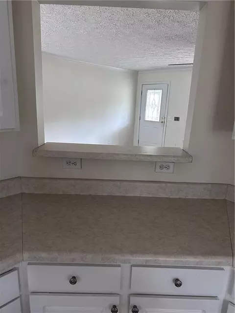Kitchen - 1077 Polson Cir NE, Shellman Bluff, GA 31331 photo 2 of 6