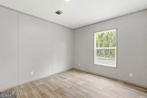 Bedroom - 2099 Susie Baker Rd NE, Shellman Bluff, GA 31331 photo 2 of 3