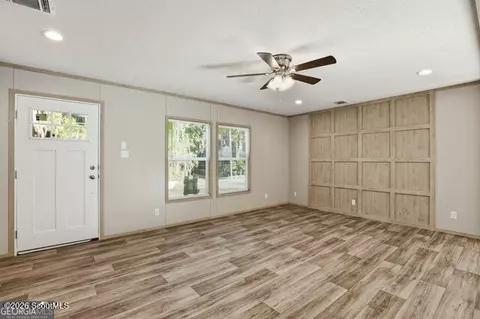 Living - 2099 Susie Baker Rd NE, Shellman Bluff, GA 31331 photo 1 of 4