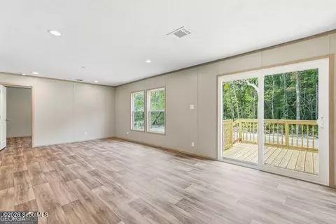 Living - 2099 Susie Baker Rd NE, Shellman Bluff, GA 31331 photo 4 of 4