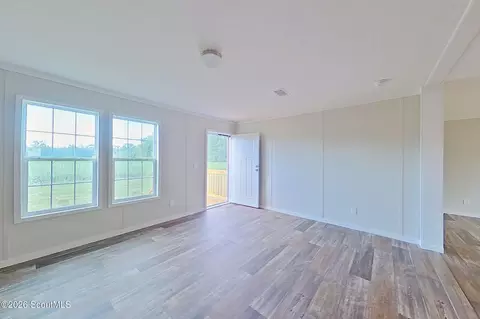Living - 6982 College Ave, Blackshear, GA 31516 photo 2 of 2